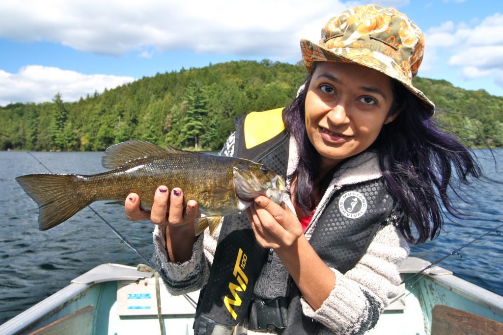 Teaching her to bass fish can be a date night memory to last a lifetime