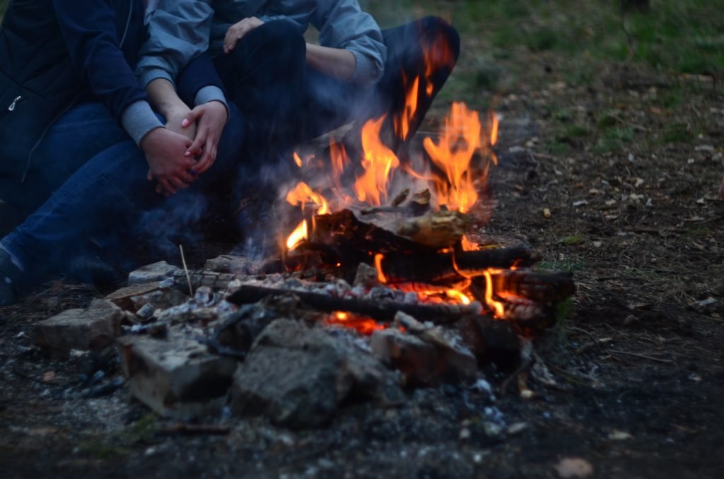 A campfire dinner by the lake at the end of a valentines day can make the date all that much more memorable.