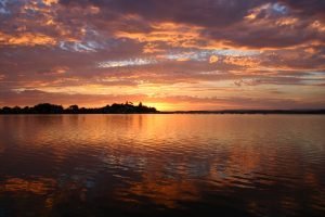 Sunrise at a lake is a popular fishing time
