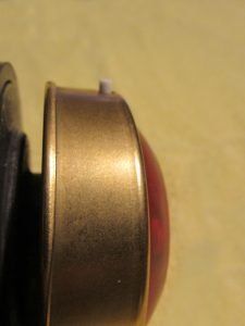 The pick-up pin on the spincast reel feeds the line around the stationary spool.