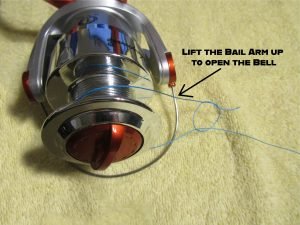 Make sure the bell is open when you begin spooling your spinning reel