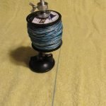 There are pegs available with suction cups to allow you to spool your reel virtually anywhere.