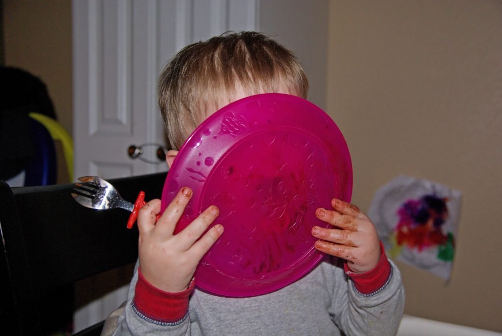 When they like the food they're offered, there's no getting between a kid and his plate.