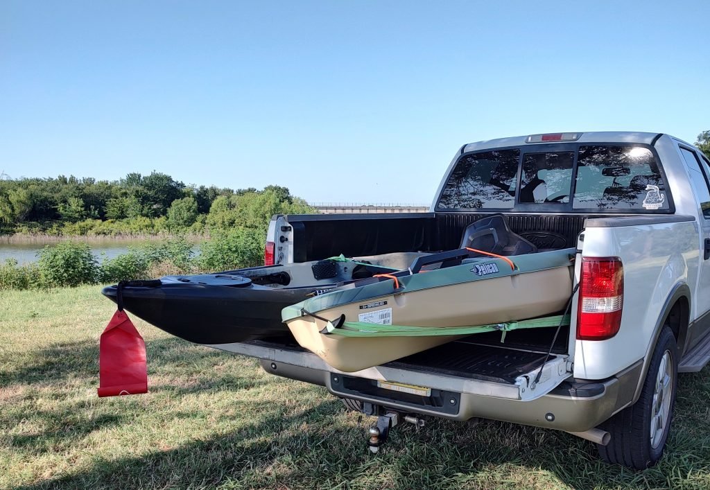 Depending on size and modifications, multiple kayaks can be transported very easily in the bed of a pickup.